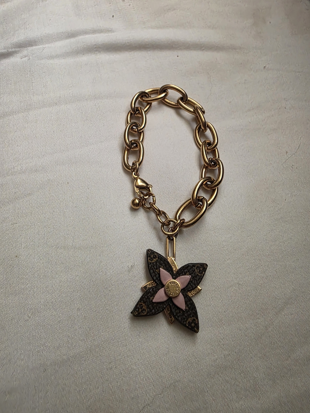 Louis Vuitton Gold-Tone Flower Charm Bracelet with Pink Accent
